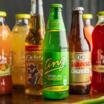 Bottles of Jamaican sodas including Ting and D&G ginger beer.